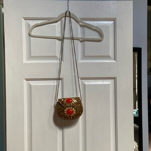 Embroidered metal purse with long chain